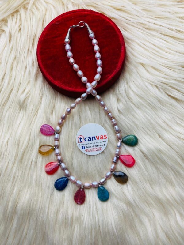 Pearl and stone made necklace